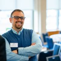 Ben Rapin talking with two guests.